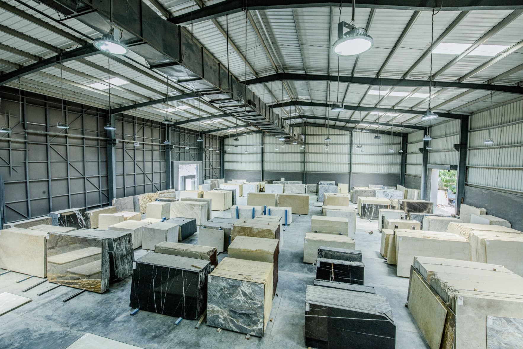 Warehouse inventory and stock on high-bay racking, the damaged goods at the center of an industrial claim